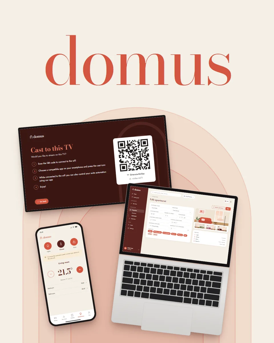 The word domus in terracotta serif type next to a TV with a welcome homepage, an open laptop with the list of stays and a phone showing a suite, lying on a cream surface with nested arches